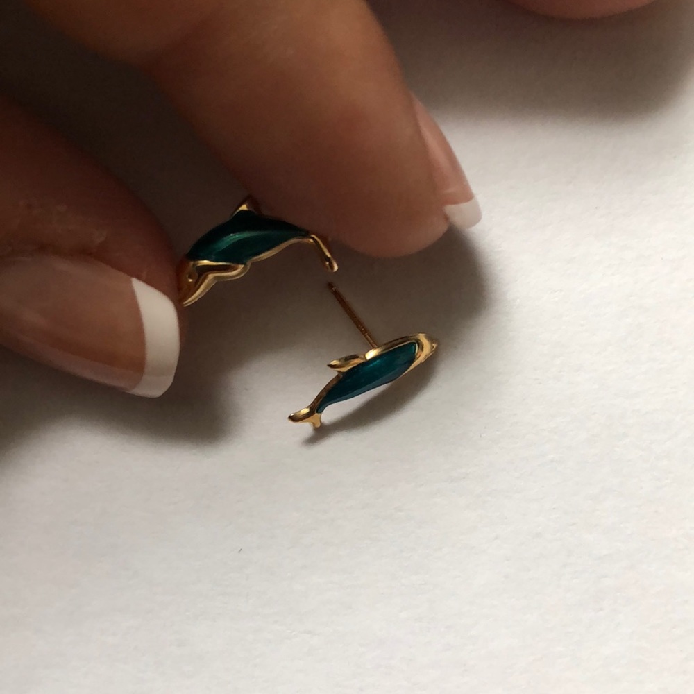 Gold dolphin earrings
